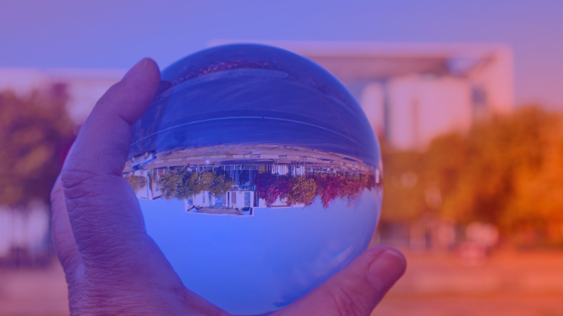 Looking Ahead to the Future of the Digital Economy Crystal ball reflecting the Chancellery in hand – symbol of the digital economy’s future and government policy